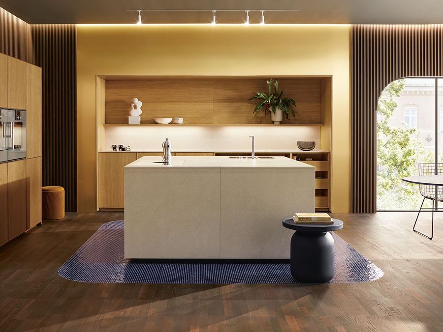 a kitchen with wooden front